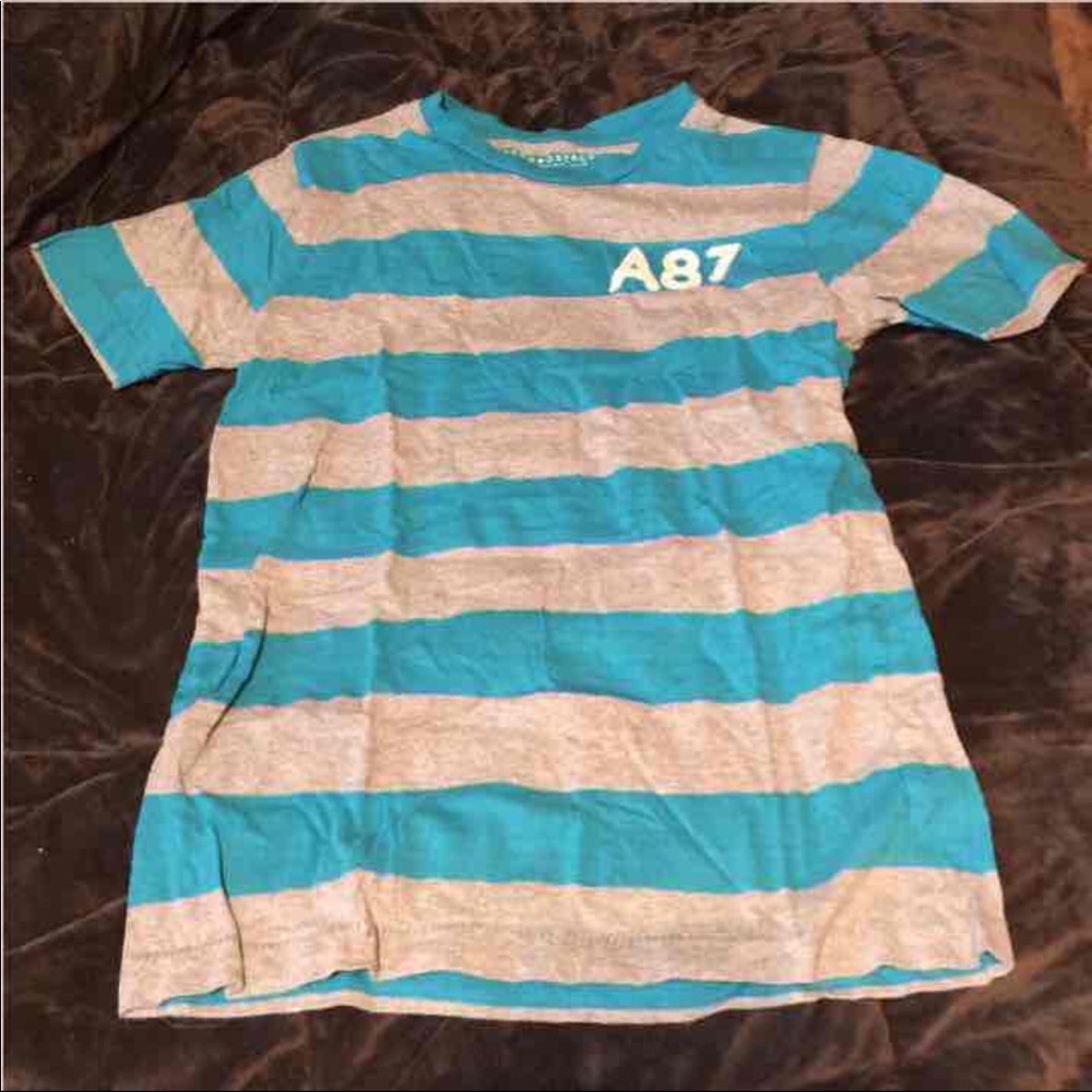 Small blue and gray top